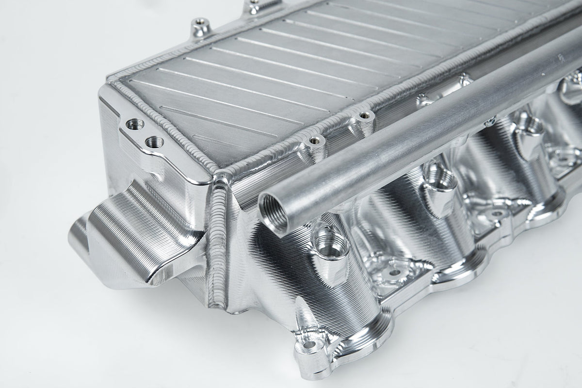 A90 Supra / BMW B58 Charge-Air Cooler Manifold - Raw Billet