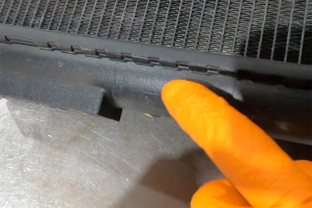 Failed OEM core-to-plastic-tank bond on the Ferrari V12 radiator