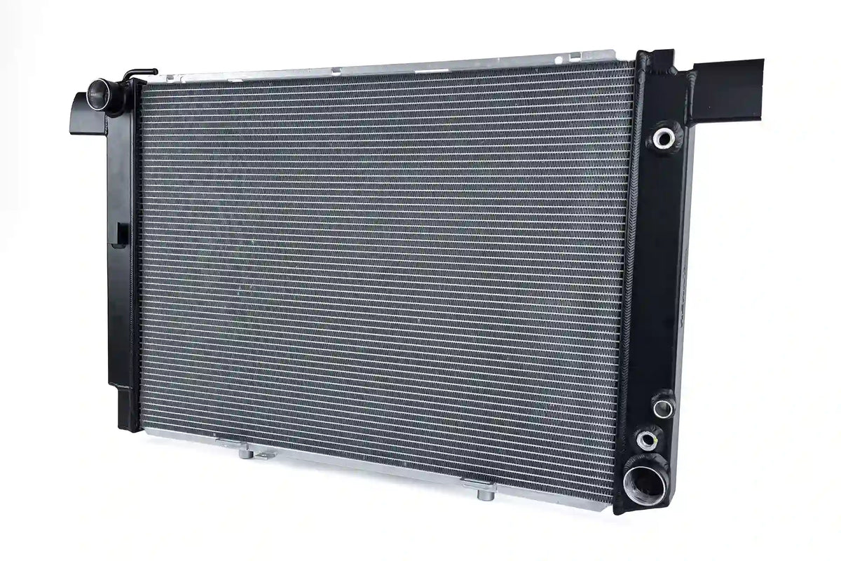 RENNTech by CSF 7240 radiator showing the inlet neck and transmission oil cooler fittings on the end tank