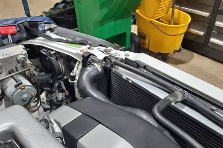 CSF 7240 radiator installed in the Mercedes-Benz R129 with coolant hoses connected