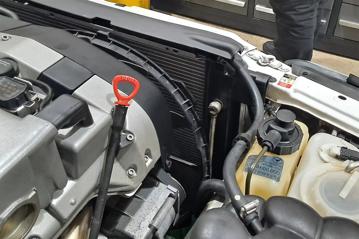 CSF 7240 radiator fitted alongside the factory coolant expansion tank in a Mercedes-Benz R129