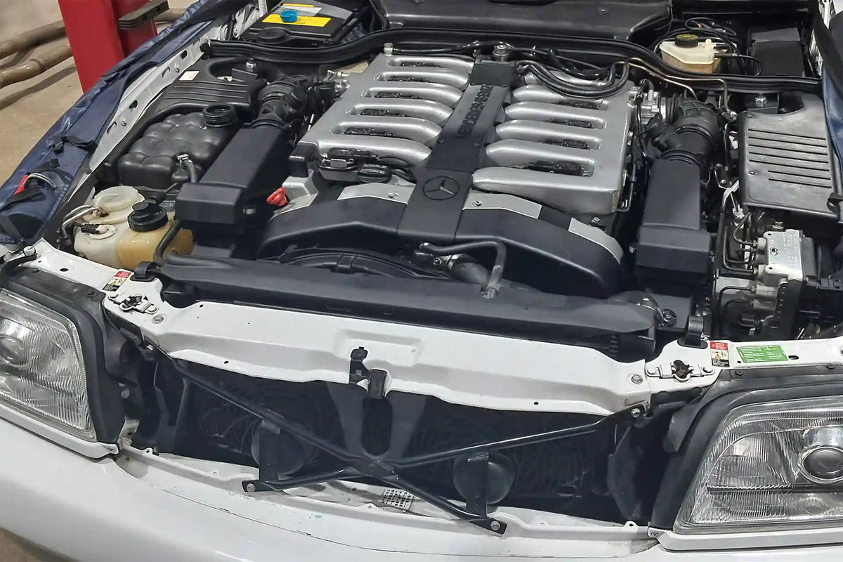 Mercedes-Benz R129 V12 engine bay with the CSF 7240 radiator installed