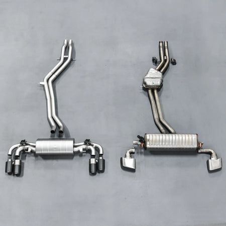 Side-by-side comparison of stock exhaust and Akrapovic Evolution Line, highlighting size difference and superior build quality.