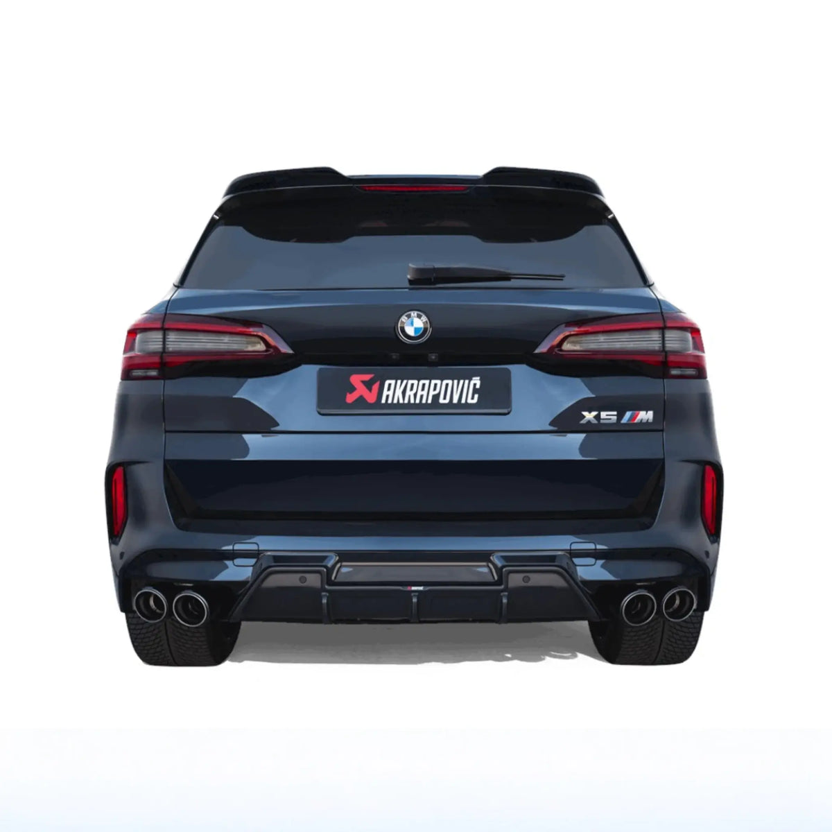 Straight-on rear view of BMW X5 M with the Akrapovič Slip-On Line (Titanium) exhaust system installed, showcasing its sleek fit and performance-focused design.