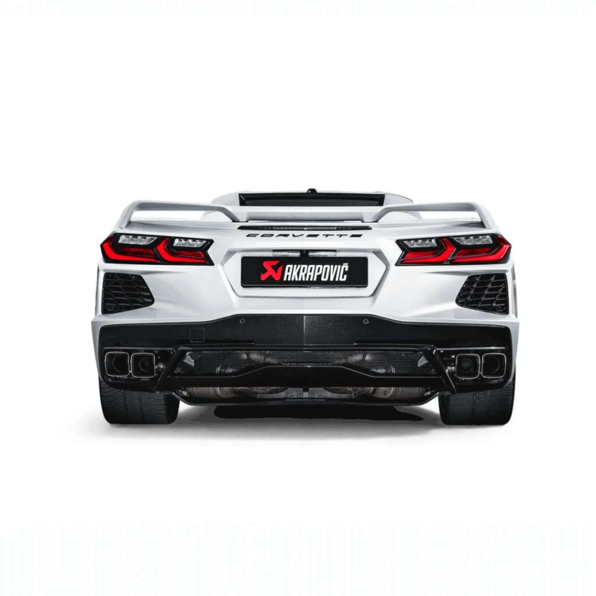 Rear view of Chevrolet Corvette Stingray (C8) featuring the Akrapovic Slip-On Line (Titanium) performance exhaust, highlighting the square titanium tailpipes and seamless integration.