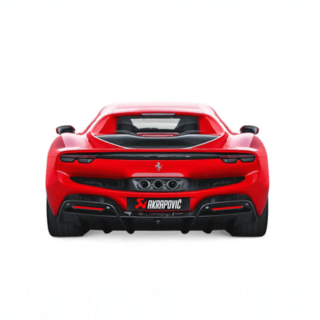 Straight-on rear shot of Ferrari 296 GTB showcasing the Akrapovič Slip-On Race Line (Titanium) performance exhaust and its triple tailpipes, designed for optimal performance and visual appeal.