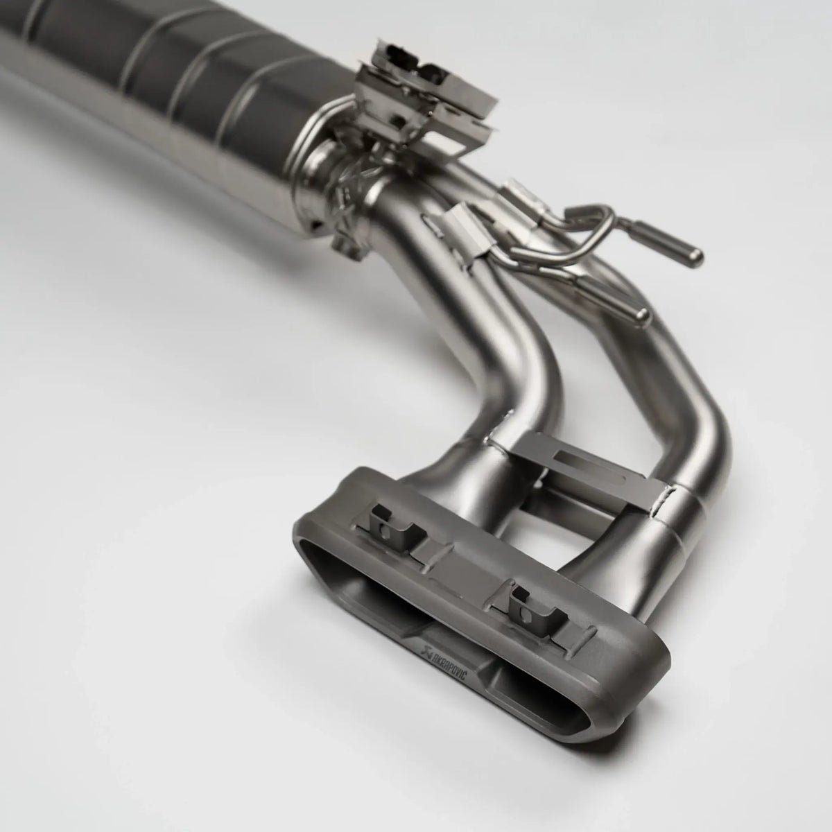 Complete Akrapovic Evolution Line Titanium Performance Exhaust System for Mercedes-AMG G 63 W465, showcasing premium titanium components and race-proven engineering.