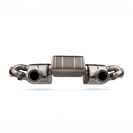 Detailed view of the Akrapovic Slip-On Race Line system for the Porsche 718 Cayman GT4 RS, highlighting titanium craftsmanship.