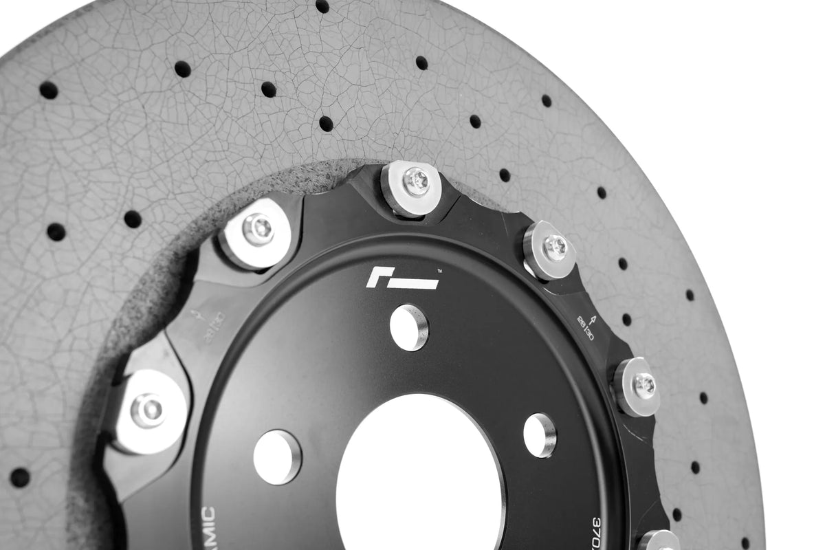 Close-up of the RacingLine aluminium bell on the carbon ceramic disc