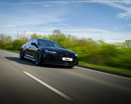 Black Audi RS6 Avant C8 on the road
