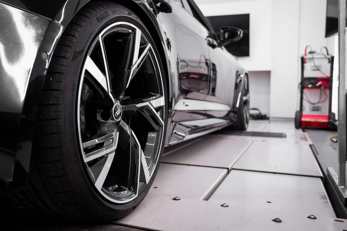 Audi C8 wheel on a workshop ramp
